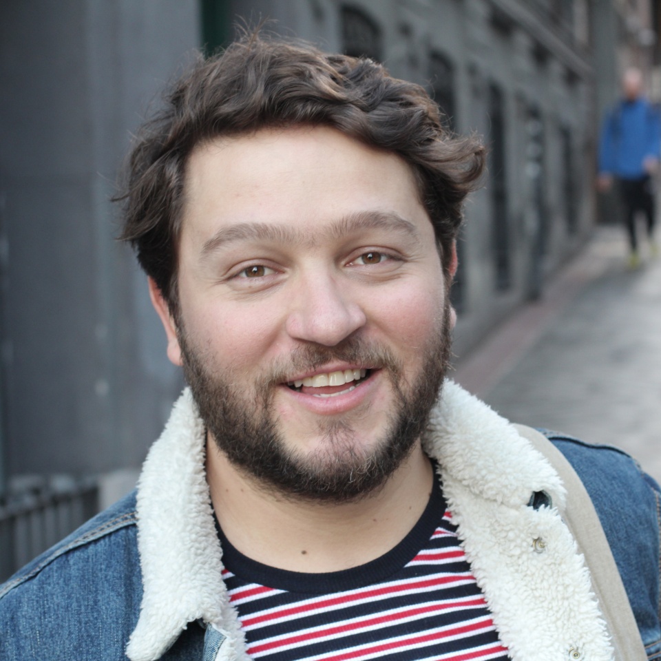 Real looking healthy guy smiling outdoors