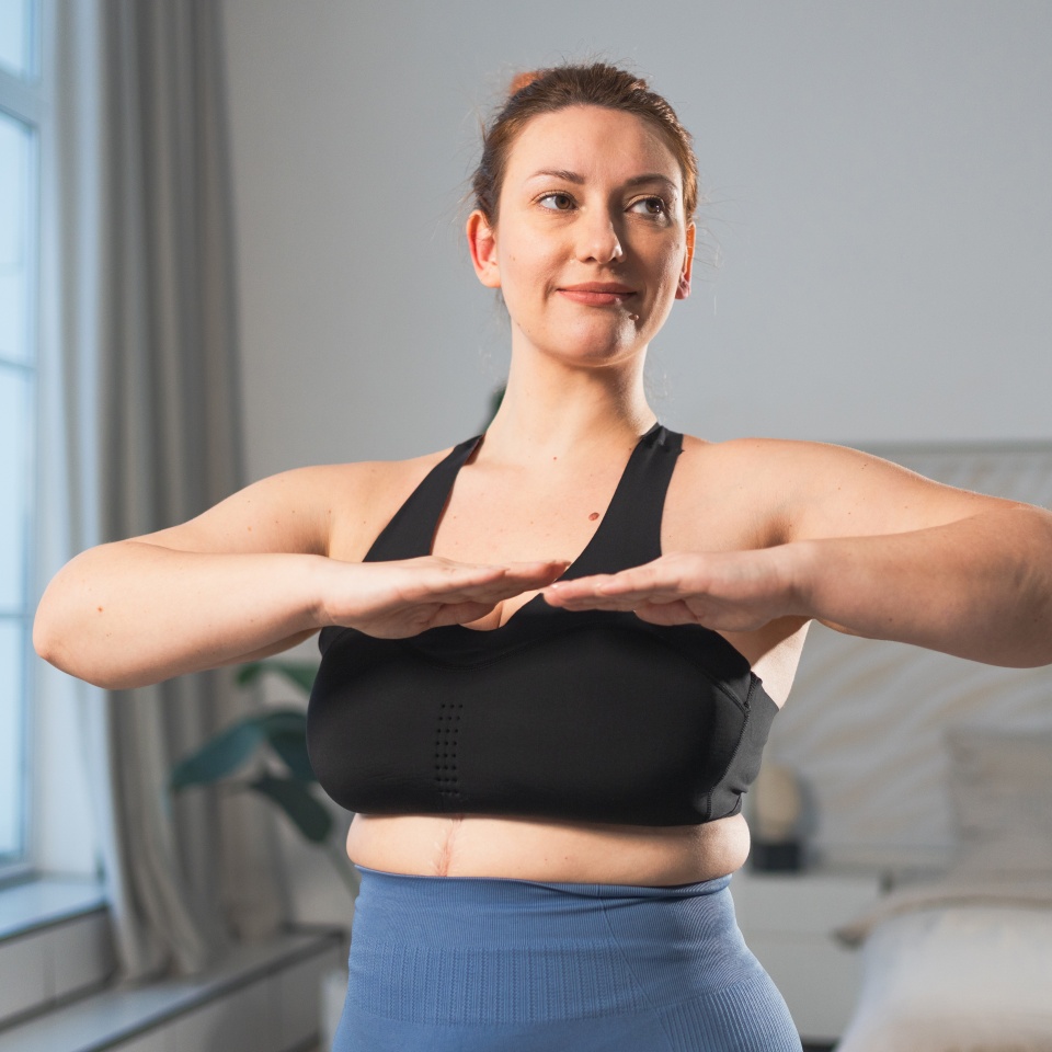 Fitness workout training. Woman practicing fitness at home. Plus size female doing sports exercise at home indoor. Girl in sportswear have workout weight training for weight loss. Sport and fitness